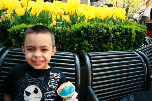 Five-year-old Pedro Correa took a break from daycare with a sno-cone at Mister Softee at 26th Street.